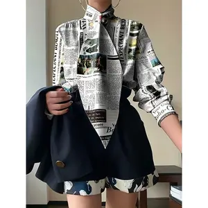 Chic Polyester Newspaper Print Blouse – Elegant long-sleeve office top with a stand collar, available in sizes S–2XL. Women’s winter casual wear made from comfortable fabric.