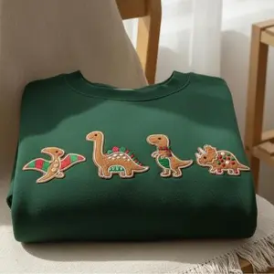 [MADE IN US] Embroidered Gingerbread Dinosaur Sweatshirt, Cute Holiday Dino Crewneck, Christmas Embroidery Shirt, Cozy Unisex Winter Outfit, Festive Gift Idea