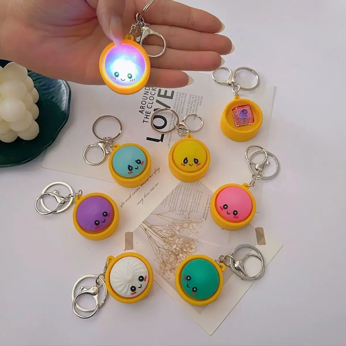 Cute Cartoon Steamer Bun Keychain, Mini Pressable Plastic Fidget Toy with LED Glow, Portable Bag Charm for Sensory Stress Relief