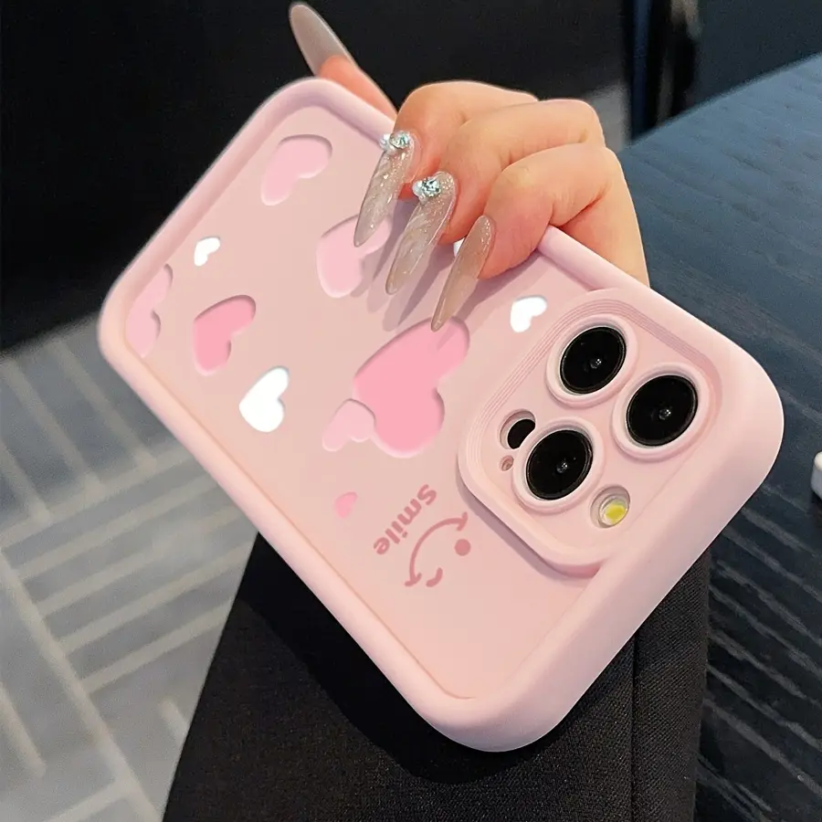 Pink phone case with heart and smiley face patterns, suitable for iPhone 17, 17 Air, 15 Pro Max, iPhone 16/14 Plus/13 Pro/12Mini/11/X/XS MAX, provides comprehensive protection, fashionable choice, perfect for holiday gifts