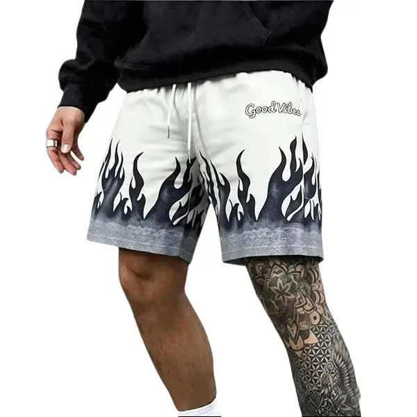 SUMIMERVIBESMen’s flame-pattern shorts featuring a black-and-white gradient flame print, elastic waistband, breathable casual street style, suitable for everyday wear and sports.