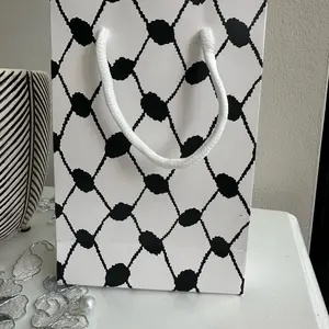 Three Keffieyeh print gift bag