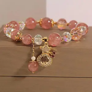 Natural strawberry crystal bracelet female niche high-end sense money bag pendant crystal bracelet girlfriend best friend gift hand jewelry