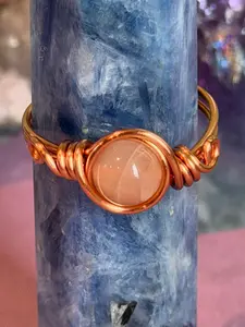 Peach Moonstone size 11 copper wire-wrapped ring