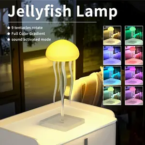 A Contemporary LED Lamp Designed Like a Jellyfish, Featuring Voice Control, a 2000Mah Lithium Battery, Full-Color Gradients, And Realistic Tentacles. It Offers an Extended Battery Life And Can Be Used As a Freestanding Or Hanging Decoration for Your