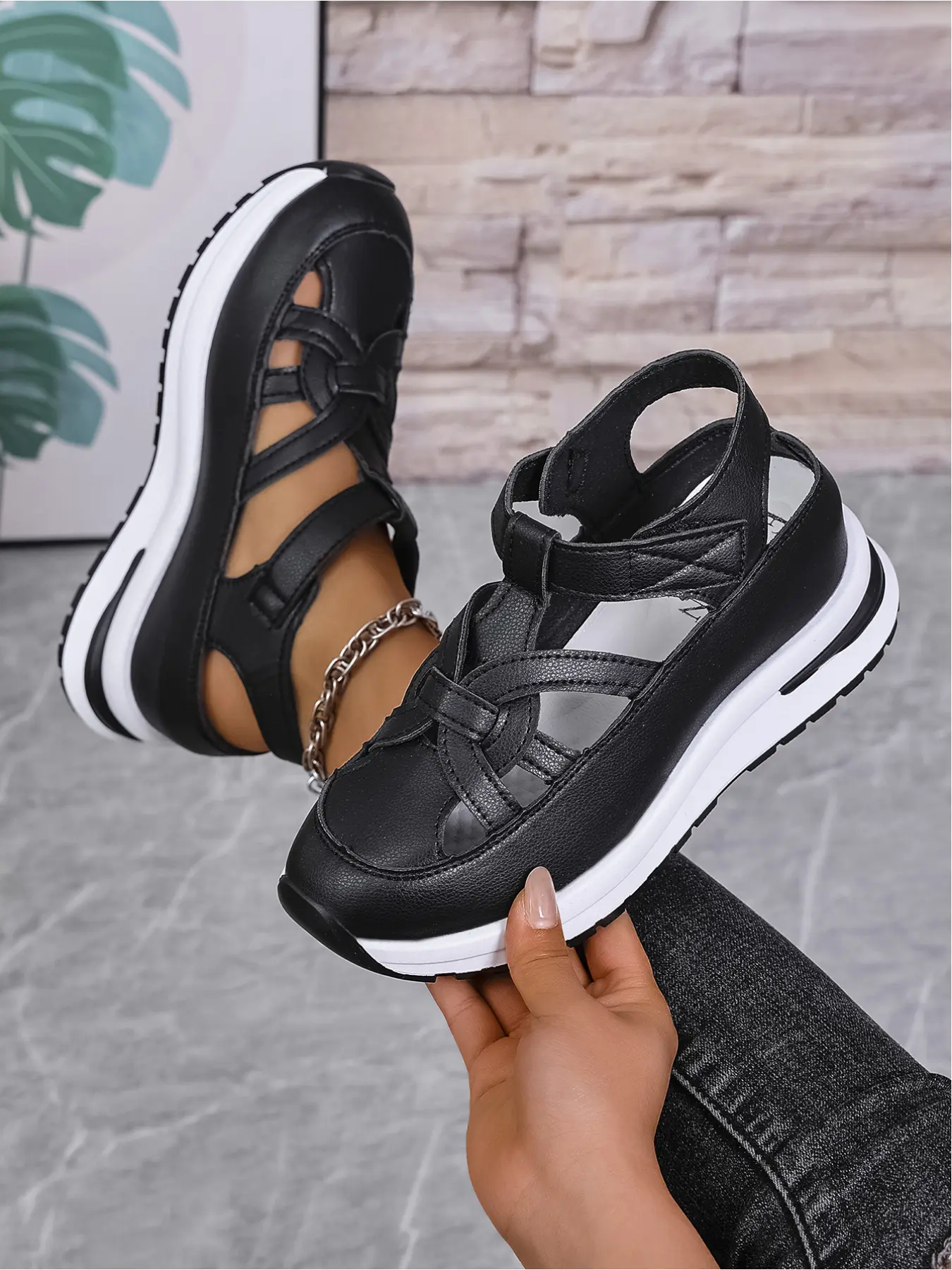 A pair of new large-size women's round-toe hollow breathable Velcro wedge Casual Summer Sandals for outdoor wear, simple and comfortable for daily light commuting with a thick sole