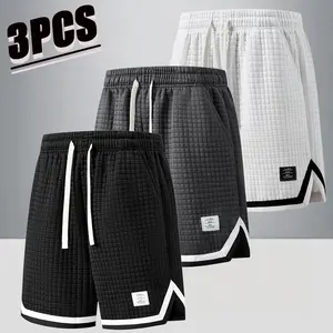 Men’s summer essential waffle-knit casual shorts, 2-pack — everyday commuting and relaxed style. Soft, skin-friendly, breathable waffle fabric keeps you cool and prevents sweat from feeling stuffy. Drawstring waistband for a loose, non-restrictive fit. Co