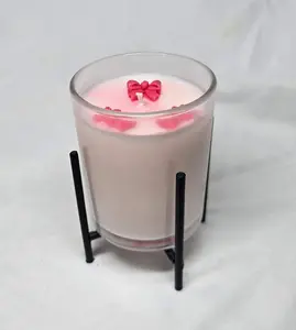 Pink candle with stand