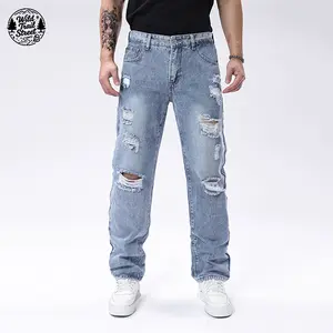 Men’s distressed jeans with a unique worn look and rips, light blue wash with multi-layered frayed edges, suitable for everyday styles and streetwear looks.
