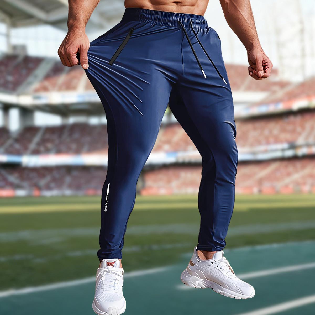 Men's lightweight ice silk fiber fabric joggers with quick-dry elastic waistband and hidden zipper design, breathable and comfortable straight-leg pants, suitable for casual wear, outdoor activities, and party style.