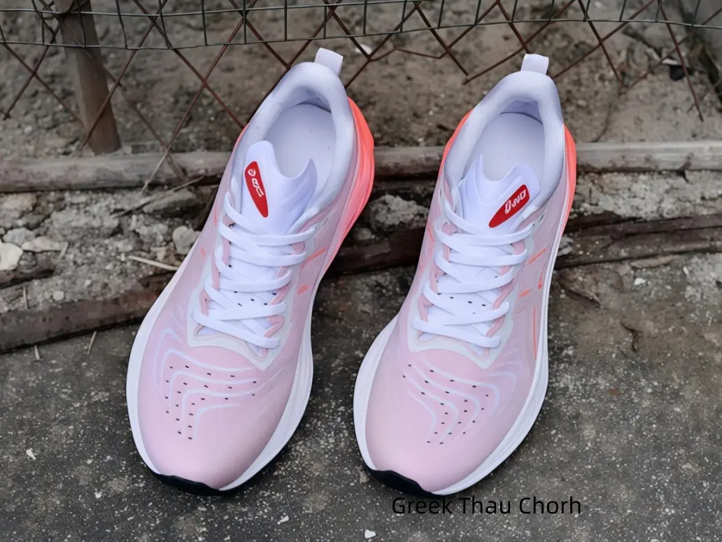 Soft blush pink mesh running sneakers with gradient coral sculpted cushion midsoles