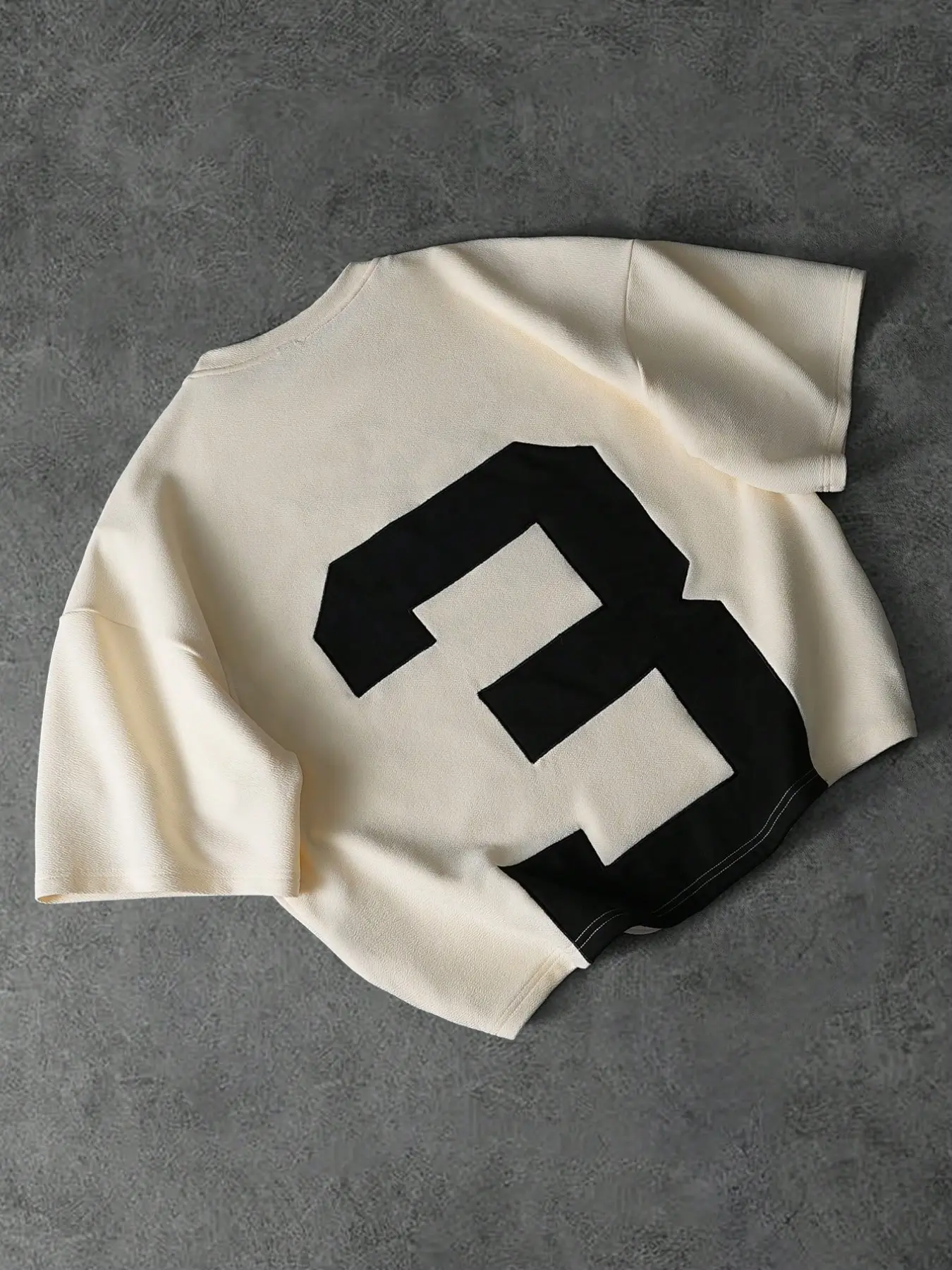 This stylish short-sleeved T-shirt is made of a textured knit fabric that feels as soft as a cloud. It has a relaxed fit, a crew neck, and a cropped cut. Casual Top