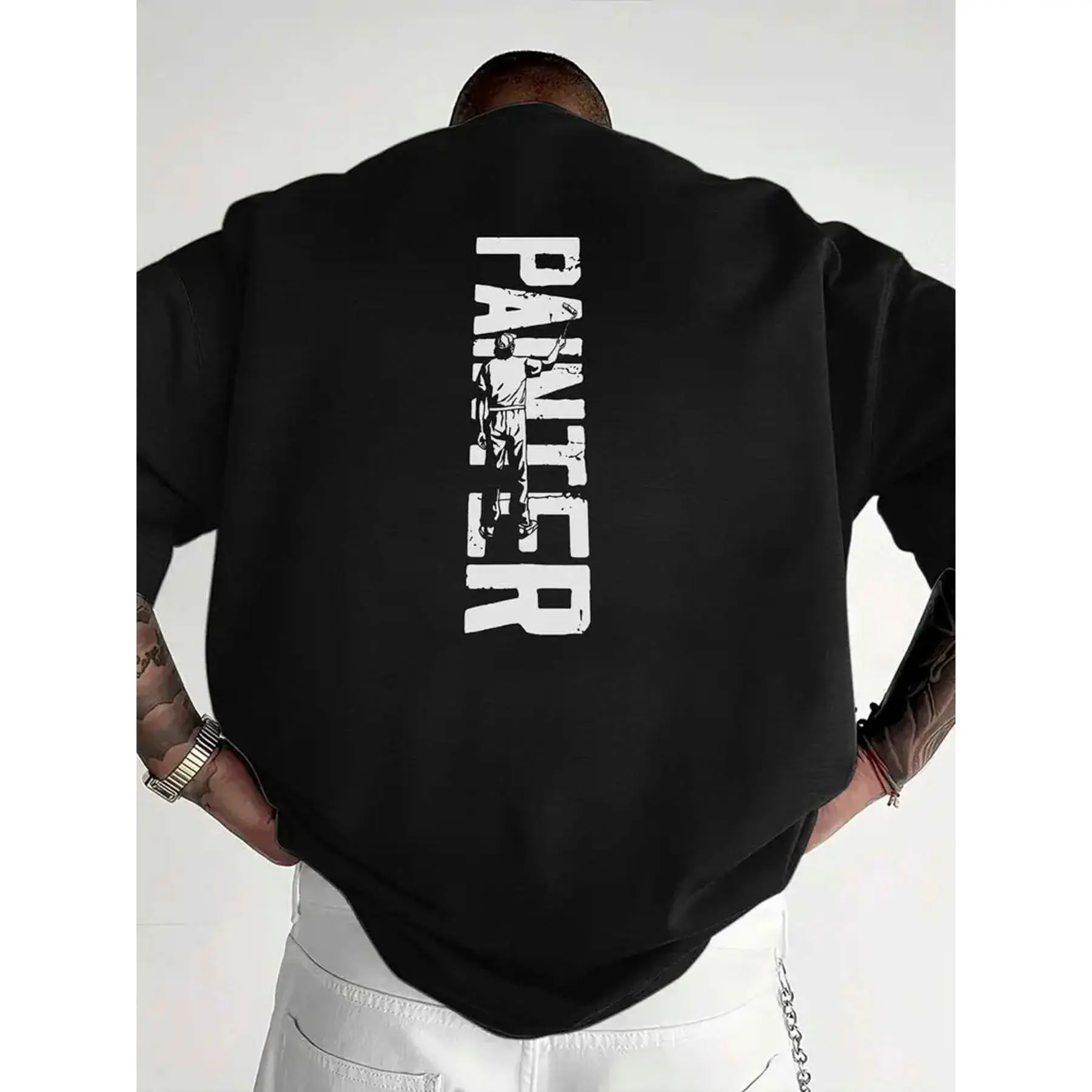 Black Long-Sleeve Shirt Featuring a Vertical White 'PAINTER' Print, Designed for Art Enthusiasts. The Back Showcases a Painter Figure with Tattooed Arms And a Silver Watch