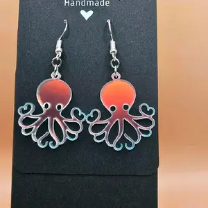 6) Frosted Iridescent Octopus Earrings