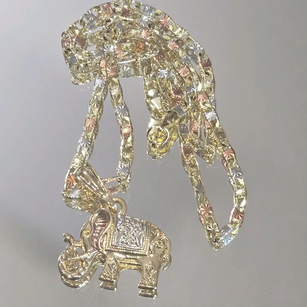 N60-1.1 Inches Tricolor elephant pendant with tricolor 3mm 20-Inch Length chain. This set is plated in 14 karat gold, weighting 10 grams not water resistant