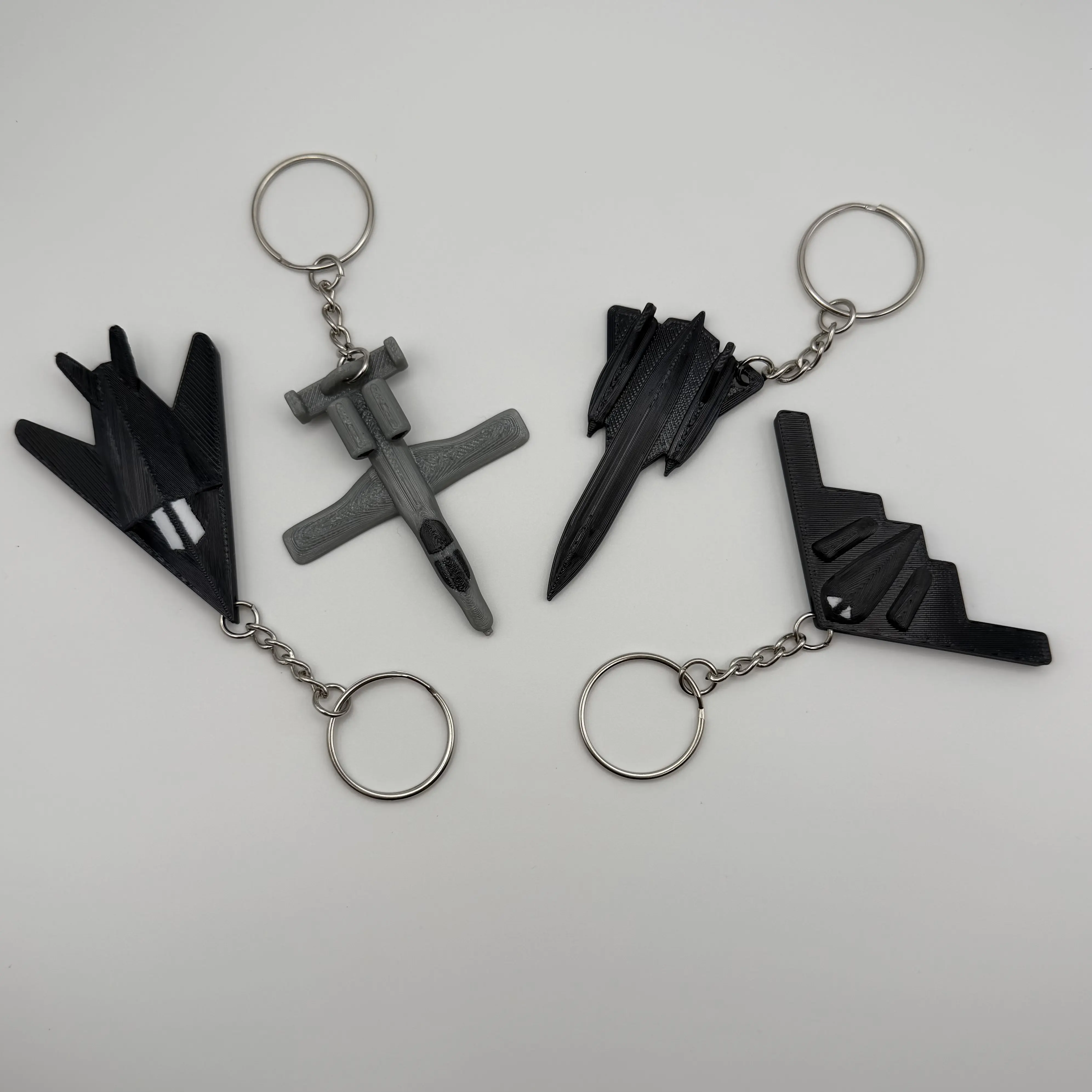 4-Pack Jet Keychain Set: SR-71 Blackbird, A-10 Thunderbolt II Warthog, F-117 Stealth Nighthawk, B-2 Stealth Bomber– Airplane Pilot Gift