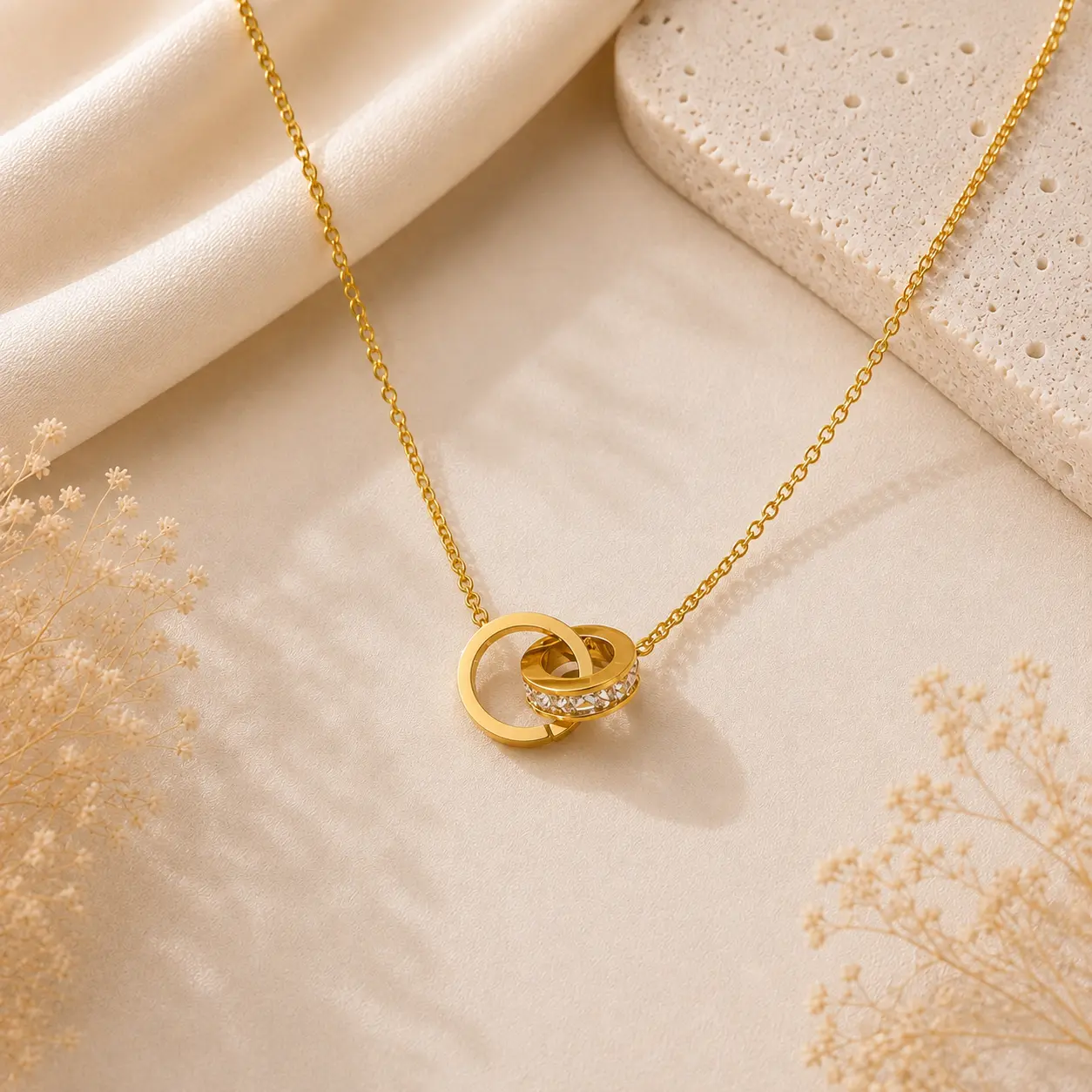 Women's Gold Tone Stainless Steel Roman Numeral Interlocking Ring Pendant Necklace with Delicate Oval Cable Chain