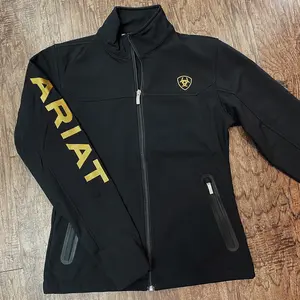 Ariat: Women New Black/Gold Team Softshell Brand Jacket