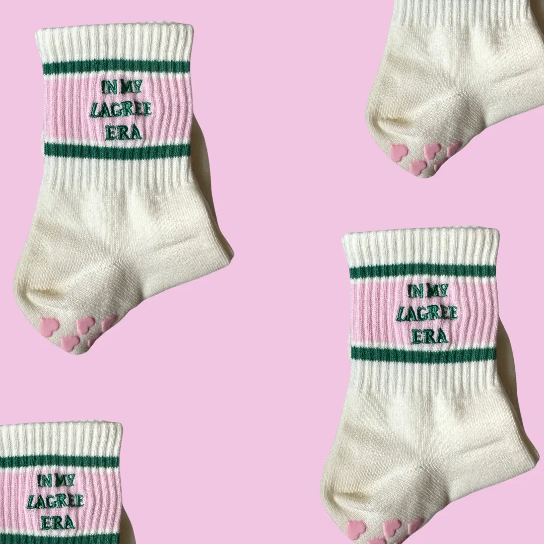 In my Lagree era non slip pink and green grip sock with pink heart grips