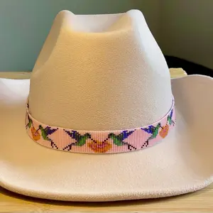 Scenic Loomed Seed Bead Hummingbirds and Orange Colored Flowers Hatband with a Light Pink Background
