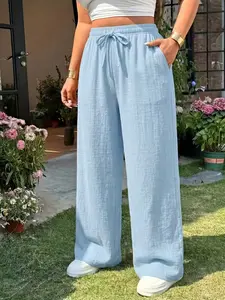 Women’s long pants with a drapey feel—ideal for home, casual outings, and leisure activities. They feature side pockets, a drawstring elastic waistband, and are a summer essential: comfortable, cool, and super versatile.