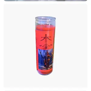 Ogou Feray ritual or devotional candle, often referred to as a "7-day candle" or "novena candle," which features a depiction of a spiritual figure or deity, along with associated symbols.