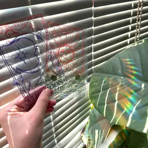 A set of two (10.5*15cm*2pcs) static cling colorful sun catchers with sun and moon ethnic style, modern home decorations for beautifying bedrooms, living rooms, balconies, and shop windows. These window stickers have double-sided visible patterns.