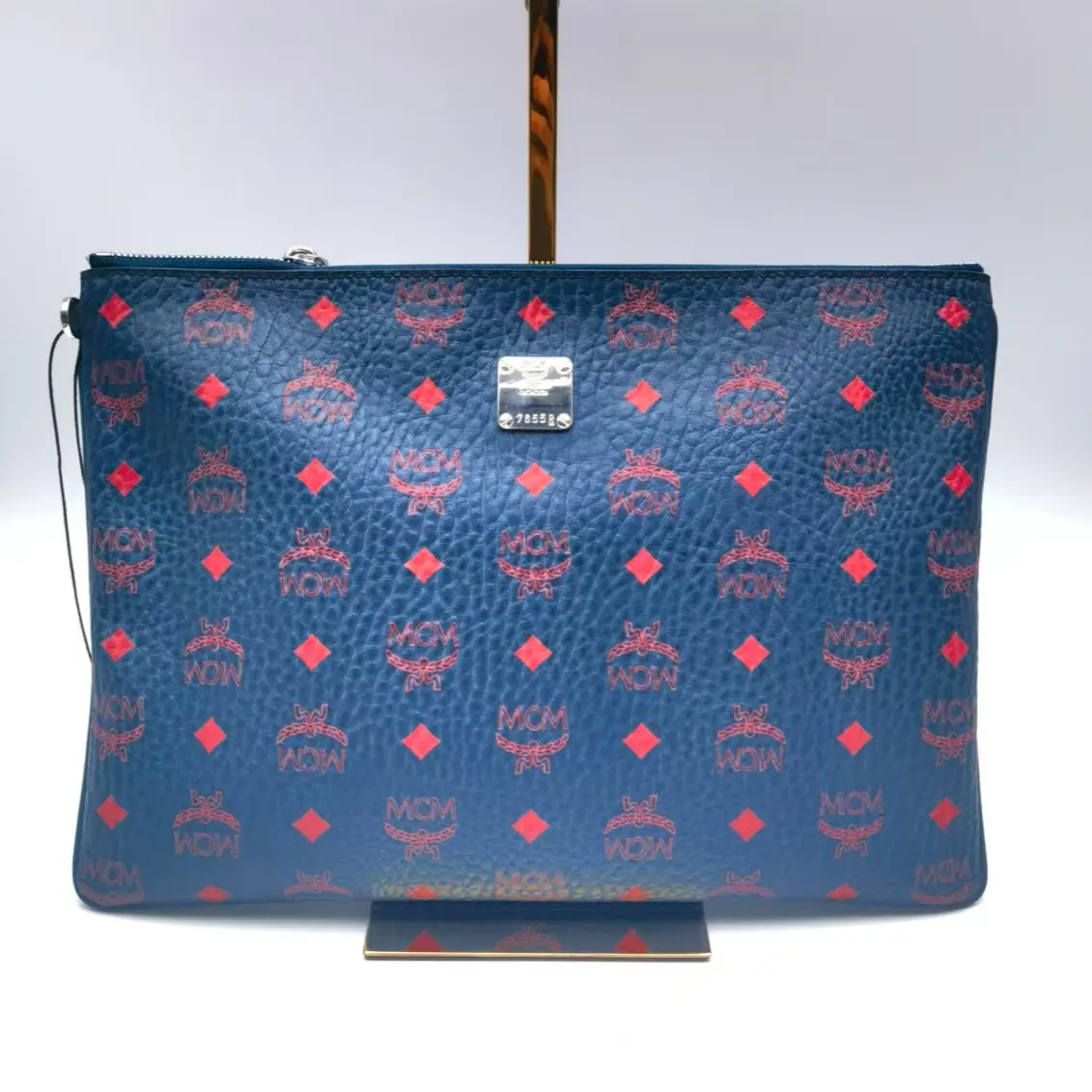 Pre-owned MCM Canvas Shoulder Bags Medium Blue Coated Clutch with Studded Print