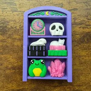 Bookshelf Fidget Clicker - Purple Shelf with Clock, Skull, Cat, Frog, and Crystal Decorations for Stress Relief or Anxiety