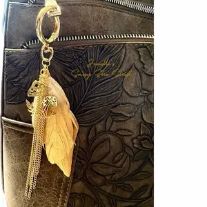 Brass Tone Mushroom Keychain with Chain Tassel and Metallic Painted Feathers Fashion Accessory for Bags and Purses