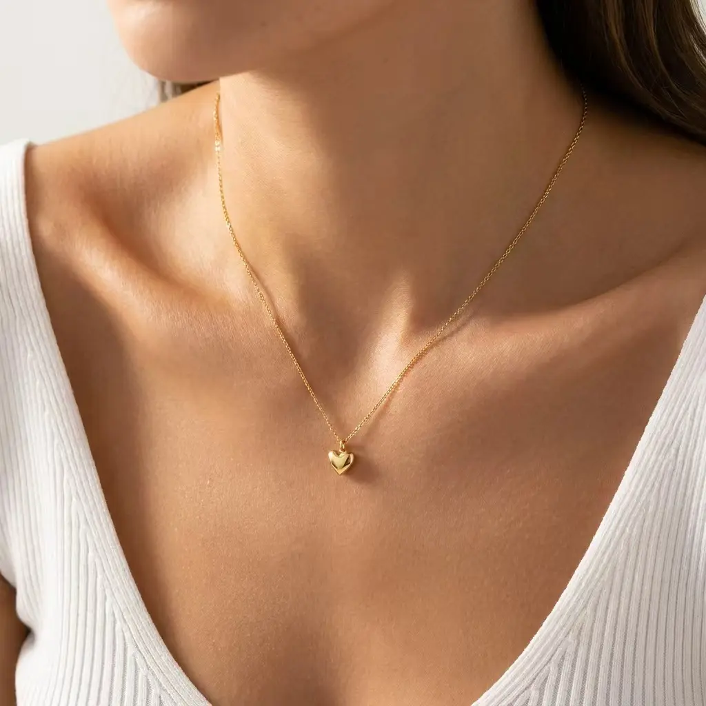 Dainty 14K Gold Heart Pendant Necklace — 16-inch chain with a 2-inch extender; a minimalist, petite piece perfect for layering. An ideal gift for mothers, wives, or girlfriends; jewelry for Valentine's Day and birthdays.