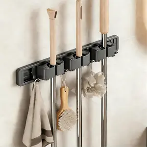 Wall mounted broom mop rack with adjustable hooks, suitable for mop storage in narrow spaces, and wall mounted mop and broom hangers for kitchen, garage, and laundry cleaning