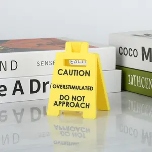 Caution Overstimulated Desk Sign - Yellow Sign with Black Text, Humor Gag Gift for Coworkers, Boss & Employees, Mini Novelty Desk Decor, Office Supplies