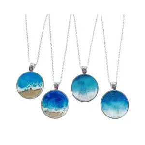 Resin Radiance Necklaces - Blue Ocean Wave Design on Silver Chains - Unique Fashion Jewelry Pieces