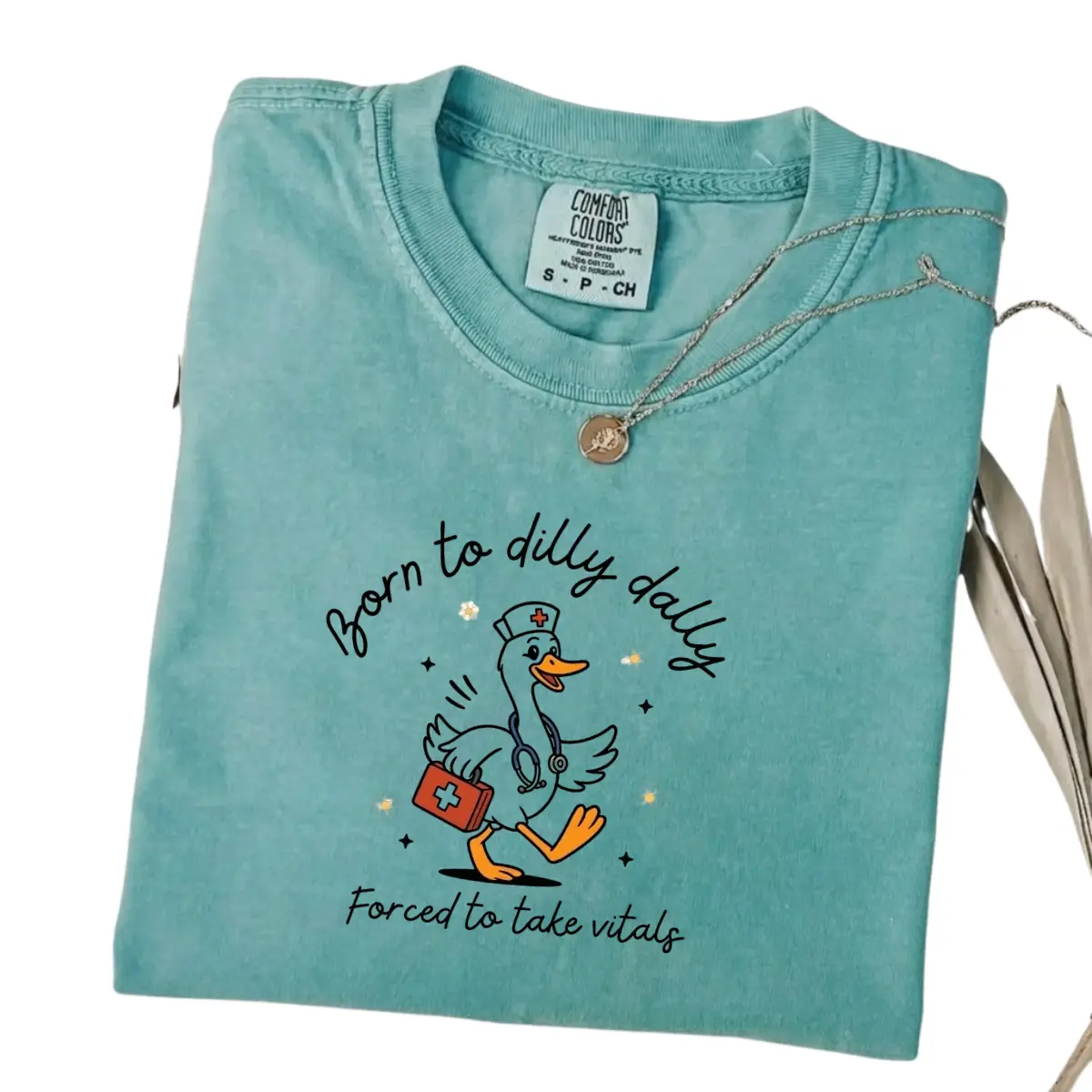 Funny Nurse Graphic T-Shirt Born to Dilly Dally Forced to Take Vitals Cute Goose Medical Humor Tee Printed on Comfort Colors Vintage Washed Teal Shirt