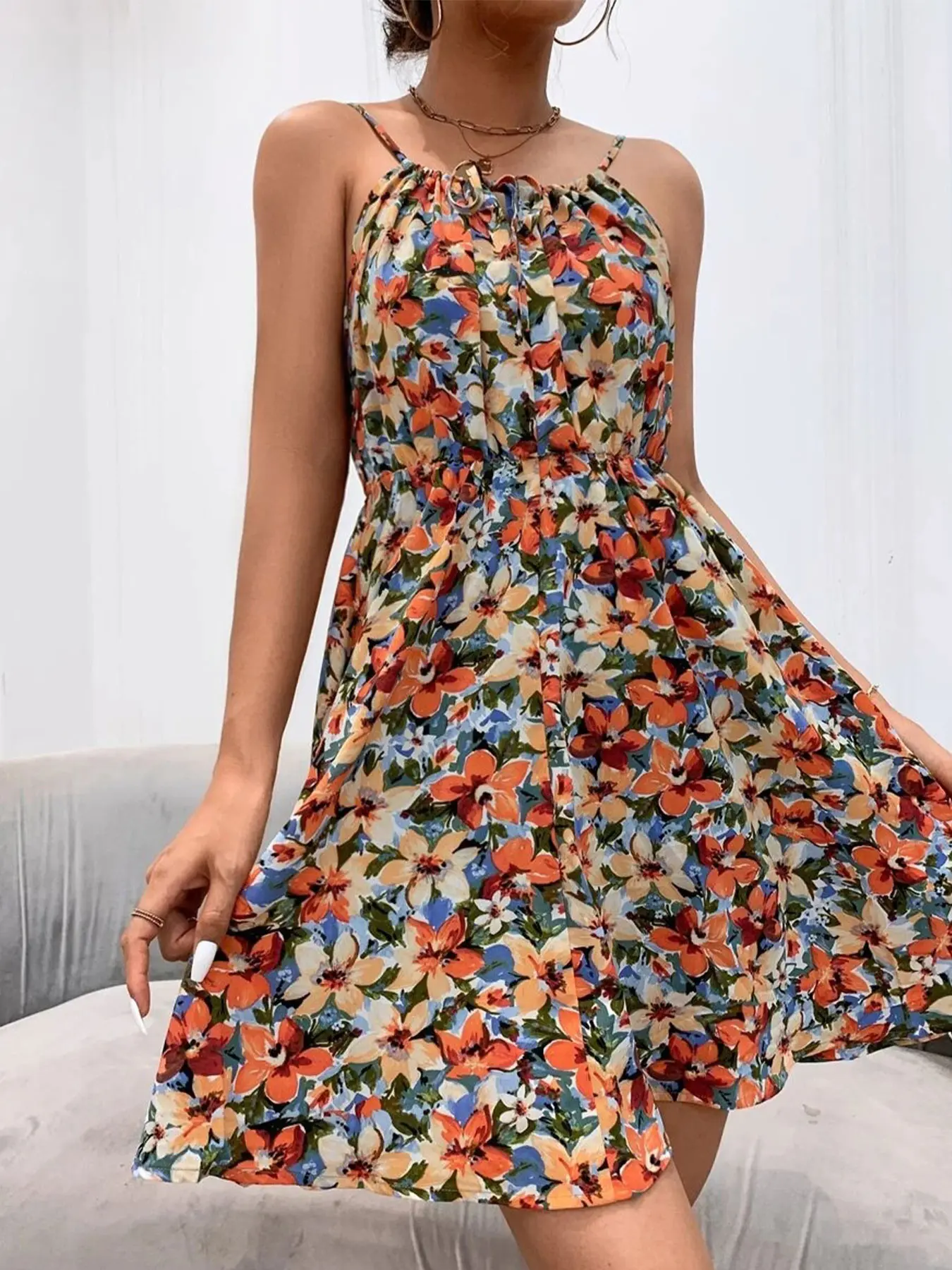 A women's elegant fashion casual printed sleeveless pullover dress with elastic waist and spaghetti straps, suitable for summer, vacation, daily street wear, and home use.