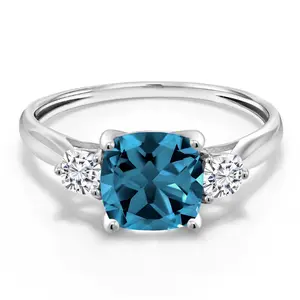 Gem Stone King 10K White Gold London Blue Topaz and White Moissanite 3-Stone Engagement Ring For Women | 2.11 Cttw | Cushion 7MM | Wedding Engagement Anniversary Promise Ring For Women