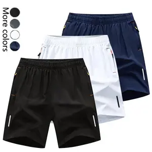 Men's quick-dry breathable shorts, casual sports style, wrinkle-resistant textured design, polyester blend solid color fabric, reflective strips, suitable for running, fitness, soccer, badminton, basketball, table tennis, weightlifting, and other sports.