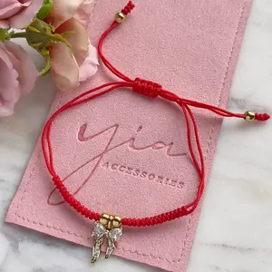 Bow red string bracelet