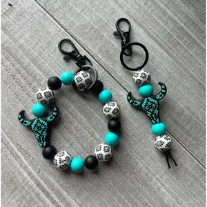 Turquoise/White Aztec Cow Skull Keychain Set