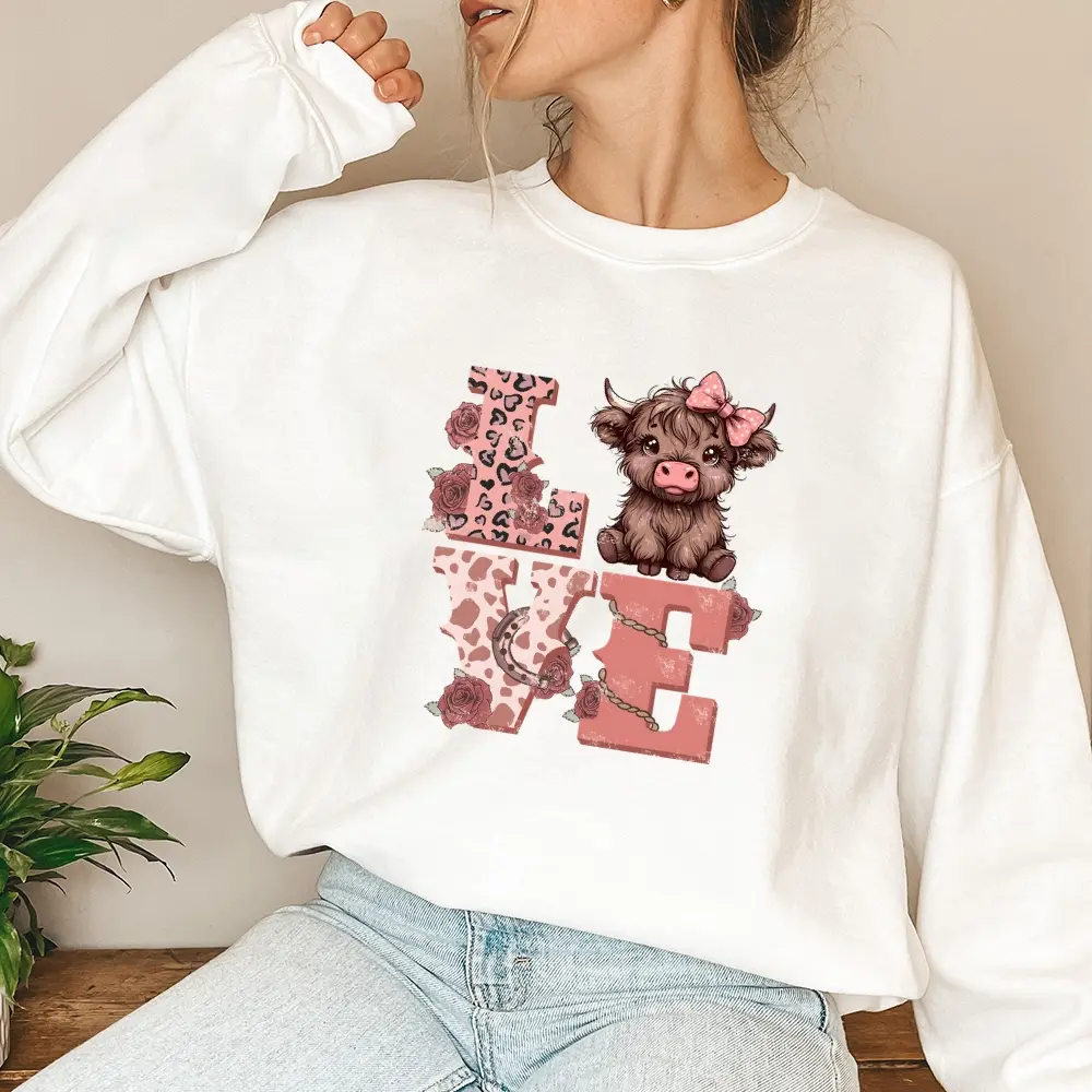 Cute, Cozy, and Full of Love! This ‘LOVE’ Sweatshirt with the Sweet Cow is Perfect for Adding Some Charm to Your Wardrobe