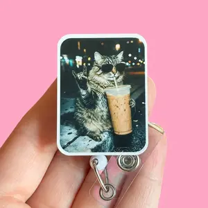 Glitter My Badge Small funny raccoon ice coffee badge reel for nurse and hospital workers. Badge clip Badge pull - Retractable swivel clip with a 360 rotation. Great gift for coworkers. Funny badge reel