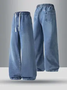 Men’s jeans with adjustable drawstrings and elastic waistbands. Fashionable men’s jeans, casual and versatile, elastic straight-leg work pants that can be worn throughout the year.