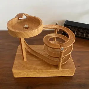 Elegant Newton's Cradle Balance Ball - Dynamic Desk Decor, USB-Powered Mechanical Pendulum with Constant Motion, Simple Design, Ideal for Office and Home, Office Decor Ornaments Brown