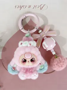 A cute pendant featuring a multi-colored plush doll, paired with a bow and pom-pom, Cute keychain, with a sweet style. Suitable for hanging on bags or keys, adding a girlish atmosphere to everyday outings, dates