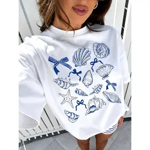 Seashell And Bow Graphic Tee Women Coastal Preppy Oversized Crewneck Short Sleeve Soft Cotton Summer Beach Vacation Casual Loose Fit Top