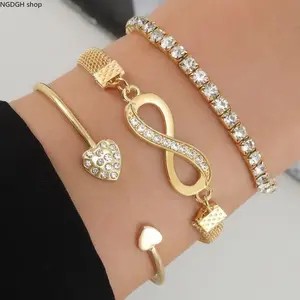 Viral Gold Crystal Infinity Bracelet Set - Luxe Tennis Chain + Infinity Symbol + Heart Pendant Stack, Sparkling Adjustable Gold Bangles for Women, Must-Have for Everyday Layering Vacation Party & Modern Jewelry Style