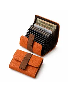 "I dumped my bulky wallet for this! 🤯 This tiny accordion card holder holds EVERYTHING" "TikTok Viral Wallet Hack! 10+ cards + cash in such a small pouch" "This little leather wallet is my new daily obsession – so compact & functional 😍"