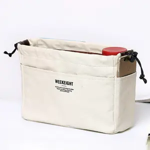 Drawstring Canvas Bag with Multiple Pockets, Lightweight & Portable Travel Storage, Spacious Main Pocket Organizer, Versatile Multi-Pocket Purse