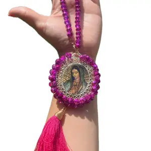 Car blessing of Virgen Mary in color pink